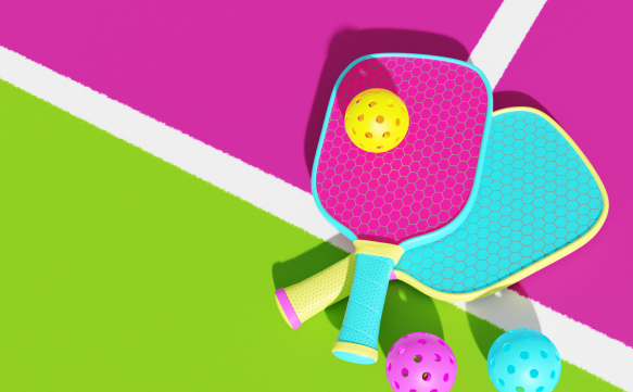 colorful pickleball balls and boards