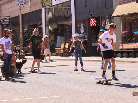 group of youn skateboarders performing manuvers